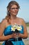 Bridesmaid beach wedding Frangipani flowers floral bouquet on beach