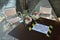 Bridesmaid`s bunches of flowers waiting for their action on a table with corona warning