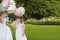 Bridesmaids Holding Balloons In Garden