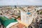 The bridge across the Maputo Bay from Maputo to Katembe, seen over high-rise buildings and streets of Maputo city centre.