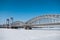 Bridge across the river Neva in winter