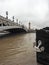 Bridge Alexandre III with river Seine and ship in the foreground at Paris, France