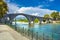 The Bridge of Arta is an old arched stone bridge that crosses the Arachthos river in the west of the city of Arta in Greece.