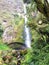 Bridge Beneath Large El Chorro Waterfall in Ecuador