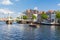 Bridge and canal boat on Spaarne river, Haarlem, Netherlands