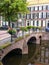 Bridge canal dutch historic buildings flowers tree