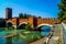 Bridge of Castelvecchio with arches over river Adige in Verona, Italy