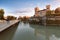 The bridge and the castle in Treviso during sunset