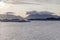 Bridge and cliffs at fake-sunset in fjord, Henningsvaer, Lofoten, Norway