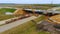 Bridge construction. Sky view of crawler crane repair bridge over highway road