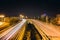 Bridge, curve road, night city landscape, freezelight car lights, long exposure,