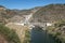 The bridge and dam over the river