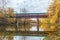 The Bridge of Dreams is a covered Bridge spanning over Mohican river in autumn
