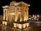 Bridge Gate (Puerta del Puente) triumphal Renaissance arch illuminated at night in Cordoba, Andalusia