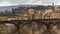 Bridge Holy Trinity Bridge over the Arno River in Florence against the backdrop of the city and the hills