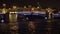Bridge with illumination over the river at night
