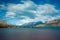 The bridge of lake Wakatipu taken in cloudy suset with long exposure at Glenorchy, Otago region, New Zealand.