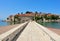 A bridge leading to a luxury hotel on the island of Sveti Stefan. Montenegro