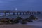 Bridge and lights at sunrise on Burgas coast