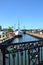 Bridge with love locks over the river. Leba town. Baltic Sea coast, Poland