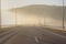 Bridge in a misty dawn