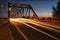 Bridge at night with car lights