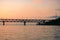 Bridge over the Amur river at sunset. Russia. Khabarovsk. Photo from the middle of the river