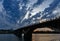 Bridge over Angara river in Irkutsk city after sunset wtih blue clouds