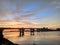 a bridge over a body of water sunshine river beutifull evening river side and blue sky amazing in the river