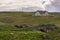 Bridge over crevasse in rural landscape, Melvaig, NW Scotland.