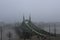 Bridge over Danube river in the fog city road panoramic photo Budapest