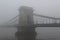 Bridge over Danube river in the fog city road panoramic photo Budapest