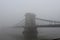 Bridge over Danube river in the fog city road panoramic photo Budapest