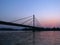 Bridge over Danube river at sunset