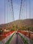 Bridge over Ganga river in Ram Jhula, Rishikesh, India