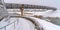 Bridge over lake in snowy Daybreak, Utah