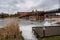 A bridge over the Nogat river with the Castle of the Teutonic Order in Malbork in the background. This is the largest