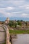 Bridge over the Olt river, view of the orthodox cathedral: Fagaras, Brasov County, Romania