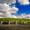 Bridge over peaceful Wharfe river