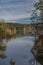 Bridge over Rimov dam with blue sky in sunny winter day