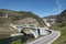 The bridge over the river and the hydroelectric dam in the background