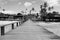 Bridge over the sea during ebb tide in black and white