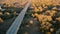 Bridge over a small river. Autumn landscape.