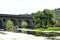 Bridge over the Tozo river full of Ranunculus aquatilis or aquatic buttercup is a species belonging to the Ranunculaceae family