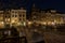 Bridge over Utrecht Oudegracht canal at night with illuminated canal houses