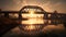 Bridge over water with the sunrise in the background, creating a beautiful silhouette, AI generative