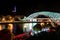 Bridge of Peace reflected in Kura River in Tblisi, Georgia