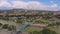 Bridge of Piece in Tbilisi, futuristic construction in modern city, aerial view