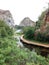 Bridge pond forest and mountain