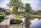 Bridge and river in old dutch village, Giethoorn
